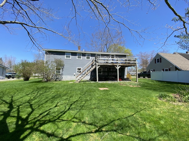 17 Canterbury Rd, Brewer, ME 04412 - rear view of property with a wooden deck, stairs, and a chimney