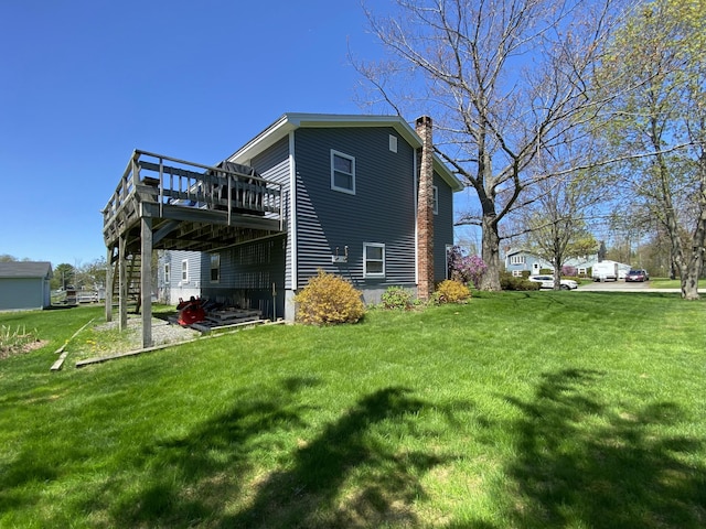 17 Canterbury Rd, Brewer, ME 04412 - rear view of house with a deck, a chimney, a yard, and stairs