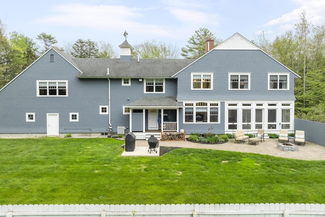 9 Edes Rd, Cumberland, ME 04021 - back of house featuring a patio, a shingled roof, and an outdoor living space