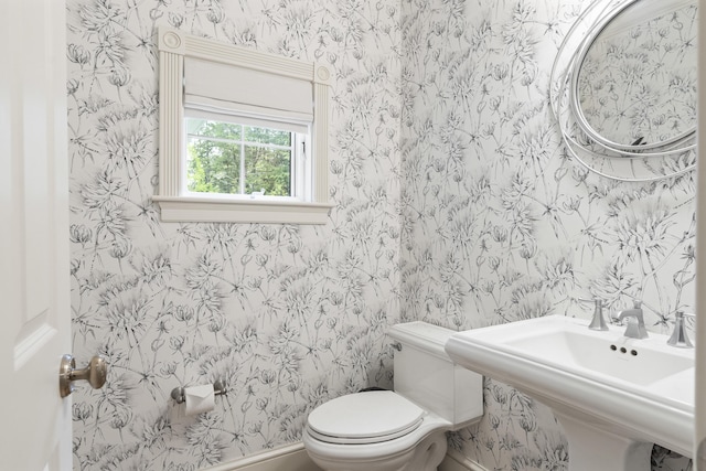 9 Edes Rd, Cumberland, ME 04021 - bathroom featuring wallpapered walls, toilet, and a sink