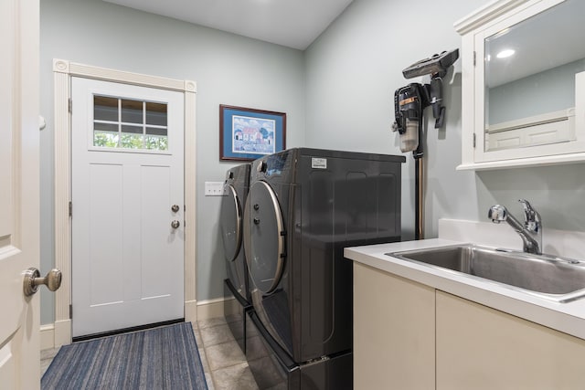 9 Edes Rd, Cumberland, ME 04021 - laundry room with washing machine and dryer, baseboards, light tile patterned floors, recessed lighting, and cabinet space
