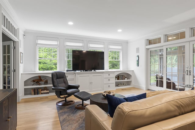 9 Edes Rd, Cumberland, ME 04021 - living area with ornamental molding, light wood-type flooring, and recessed lighting