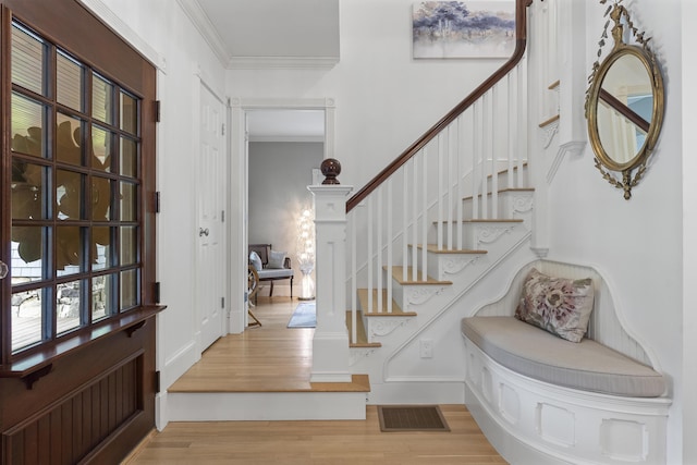 9 Edes Rd, Cumberland, ME 04021 - foyer featuring ornamental molding, light wood-style flooring, and stairs