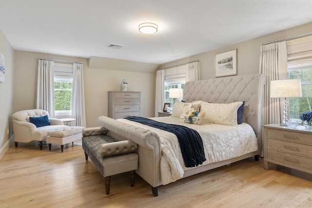 9 Edes Rd, Cumberland, ME 04021 - bedroom with multiple windows, light wood finished floors, and baseboards