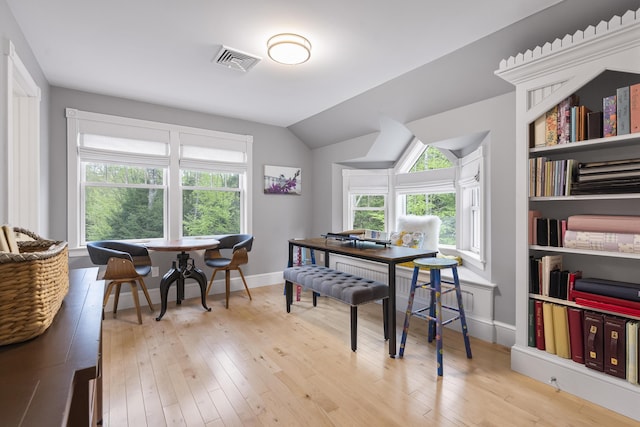 9 Edes Rd, Cumberland, ME 04021 - dining space with hardwood / wood-style flooring, baseboards, and lofted ceiling