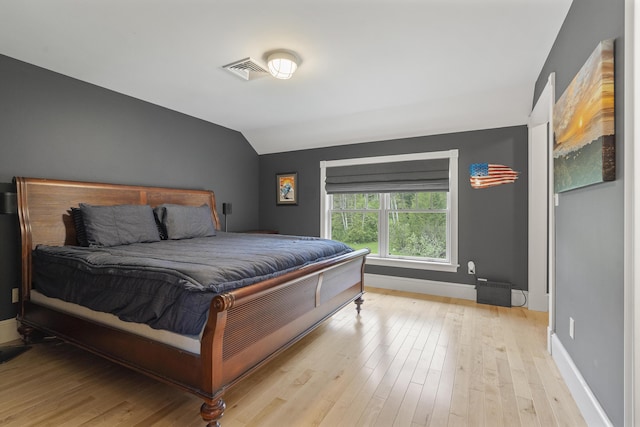 9 Edes Rd, Cumberland, ME 04021 - bedroom with lofted ceiling, light wood-style flooring, and baseboards