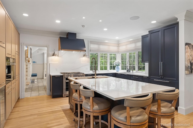 9 Edes Rd, Cumberland, ME 04021 - kitchen featuring custom exhaust hood, high end stainless steel range, crown molding, a sink, and a kitchen bar