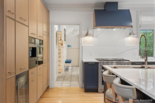 9 Edes Rd, Cumberland, ME 04021 - kitchen featuring beverage cooler, custom exhaust hood, stainless steel range, light wood-style flooring, and ornamental molding