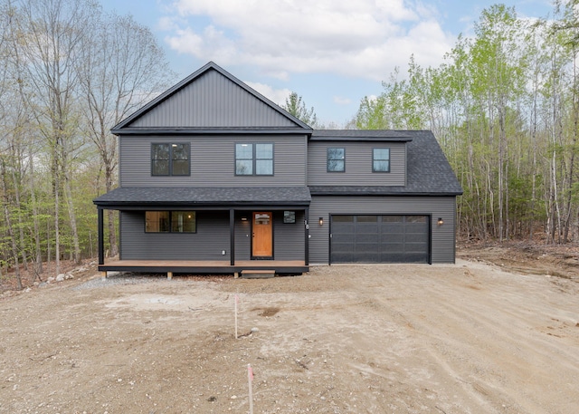 18 Aerie Dr, Gray, ME 04039 - view of front of house featuring a porch, driveway, a garage, and roof with shingles