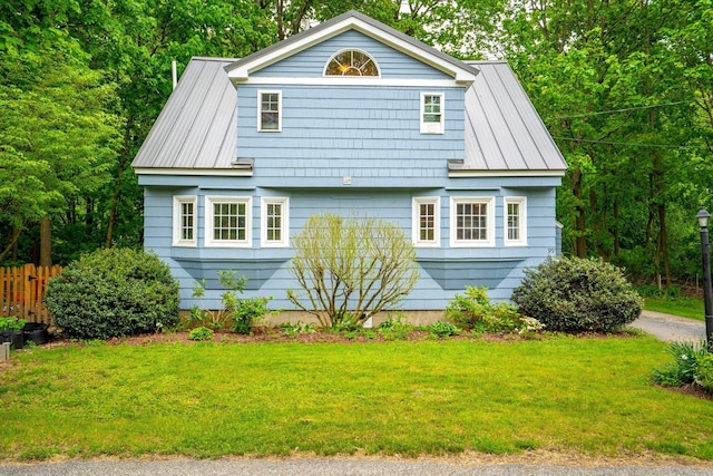 99 Spring St, Saco, ME 04072 - view of front of property with metal roof