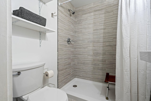 99 Spring St, Saco, ME 04072 - bathroom featuring a tile shower and toilet