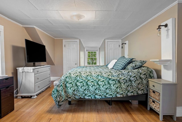 99 Spring St, Saco, ME 04072 - bedroom featuring light wood finished floors, crown molding, and baseboards