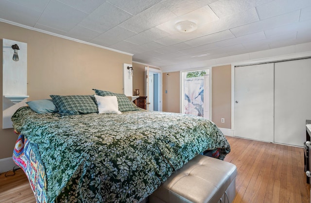 99 Spring St, Saco, ME 04072 - bedroom featuring crown molding and light wood-type flooring
