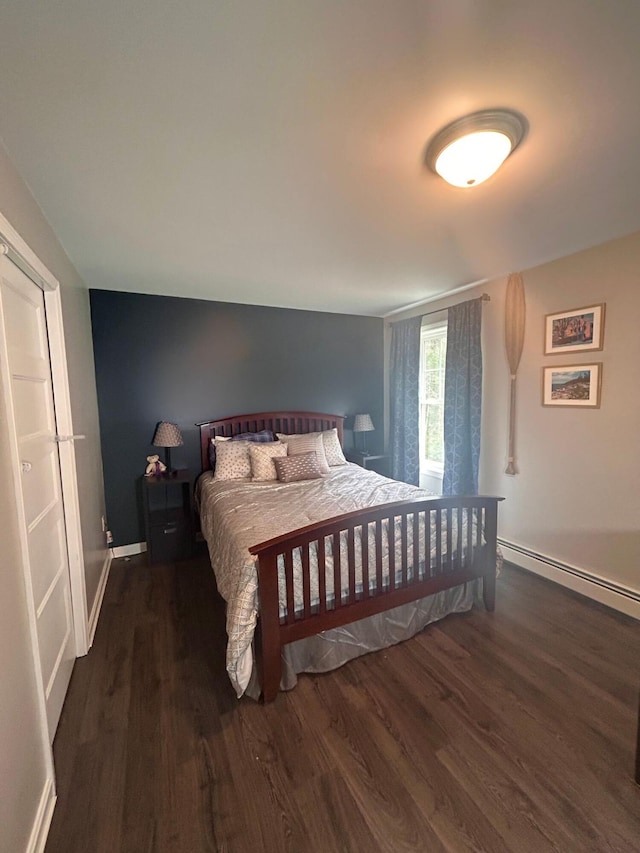 284 Roosevelt Trl, Windham, ME 04062 - bedroom featuring wood finished floors, a baseboard radiator, and baseboards