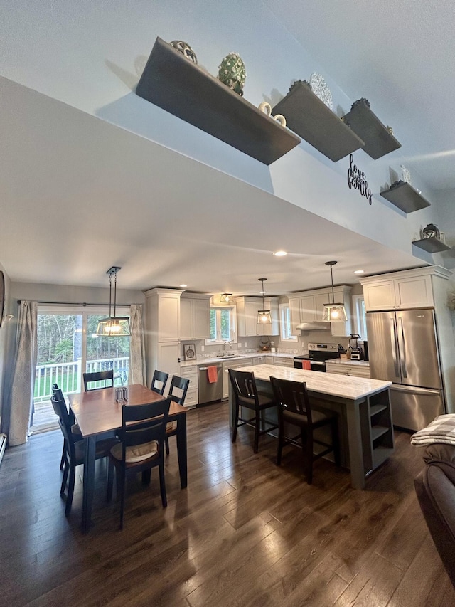 284 Roosevelt Trl, Windham, ME 04062 - dining space featuring dark wood-style flooring and recessed lighting