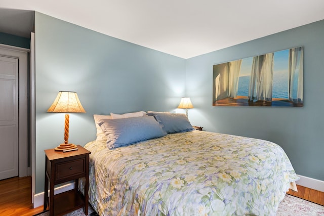 23 Amerescoggin Rd, Falmouth, ME 04105 - bedroom featuring wood finished floors and baseboards