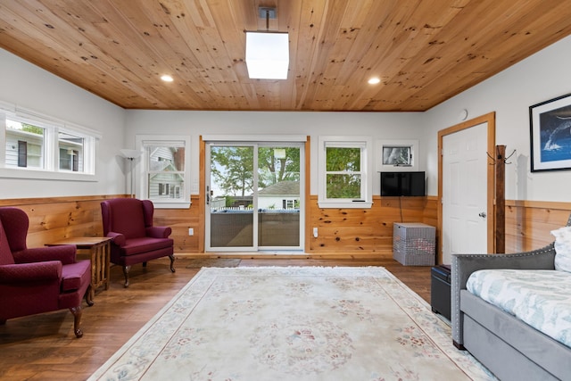 23 Amerescoggin Rd, Falmouth, ME 04105 - sitting room with wainscoting, wood finished floors, healthy amount of natural light, wooden ceiling, and recessed lighting