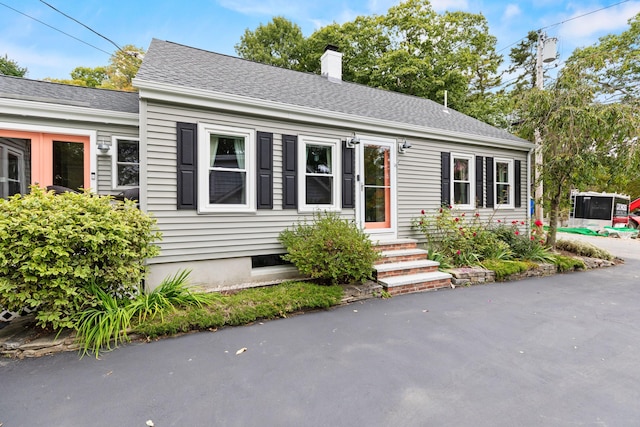 23 Amerescoggin Rd, Falmouth, ME 04105 - view of front of home with a chimney and entry steps