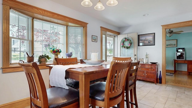 101 Parrott St, South Portland, ME 04106 - dining area with plenty of natural light, ceiling fan, and baseboards