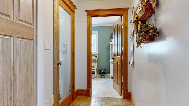 101 Parrott St, South Portland, ME 04106 - hall featuring ornamental molding, baseboards, and light tile patterned flooring