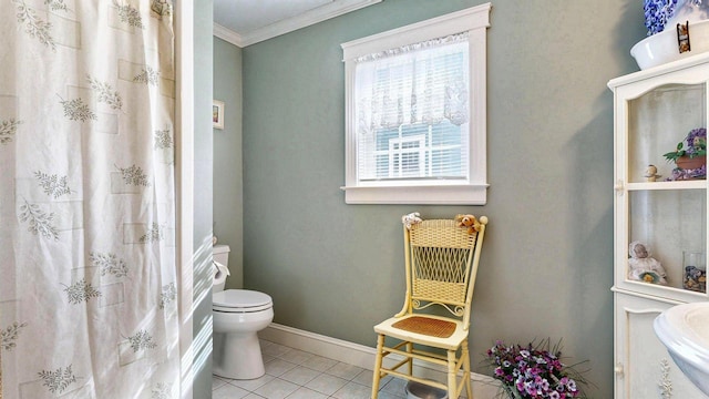 101 Parrott St, South Portland, ME 04106 - full bathroom featuring crown molding, toilet, tile patterned flooring, baseboards, and a shower with shower curtain