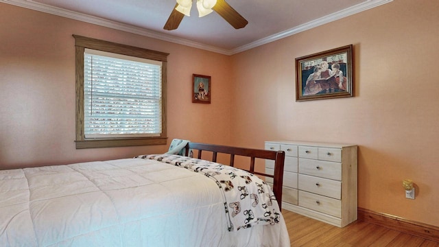 101 Parrott St, South Portland, ME 04106 - bedroom with light wood finished floors, baseboards, crown molding, and a ceiling fan