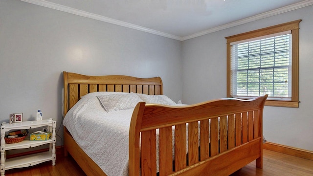 101 Parrott St, South Portland, ME 04106 - bedroom featuring wood finished floors, baseboards, and ornamental molding