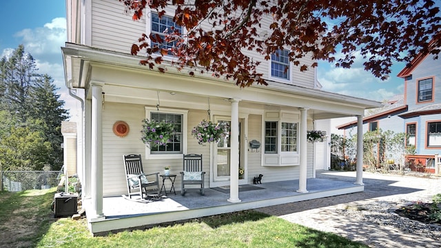101 Parrott St, South Portland, ME 04106 - back of house featuring covered porch, fence, and central AC unit