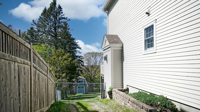 101 Parrott St, South Portland, ME 04106 - view of side of home featuring fence