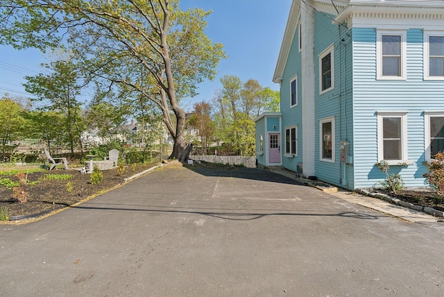 61 Granite St, Bath, ME 04530 - view of side of property featuring asphalt driveway