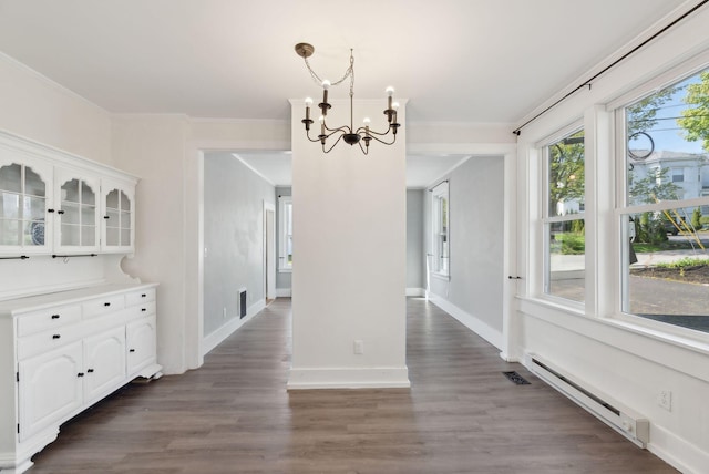 61 Granite St, Bath, ME 04530 - unfurnished dining area featuring a baseboard heating unit, a chandelier, wood finished floors, crown molding, and baseboards
