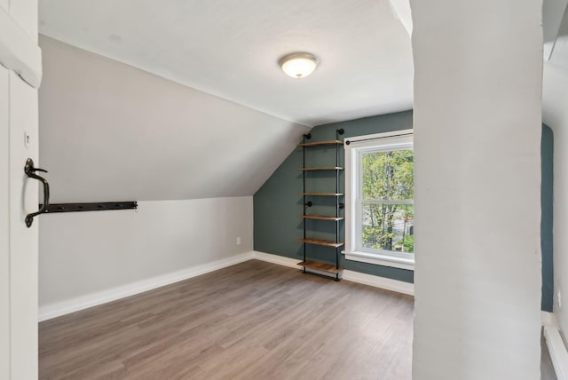 61 Granite St, Bath, ME 04530 - bonus room featuring wood finished floors, baseboards, and lofted ceiling