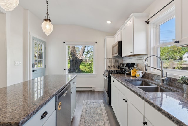 61 Granite St, Bath, ME 04530 - kitchen with appliances with stainless steel finishes, a sink, a baseboard radiator, dark wood-type flooring, and white cabinets