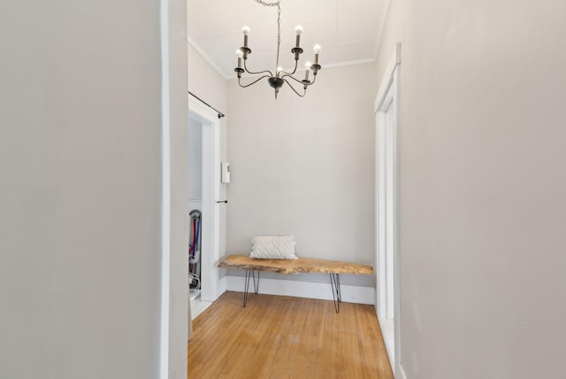 61 Granite St, Bath, ME 04530 - mudroom featuring a chandelier, light wood finished floors, crown molding, and baseboards