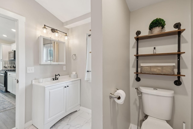 61 Granite St, Bath, ME 04530 - bathroom featuring baseboards, toilet, marble look tile flooring, and vanity