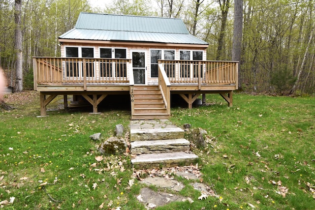 106 Shady Ln, Newport, ME 04953 - rear view of property featuring a wooden deck, a lawn, metal roof, and stairway