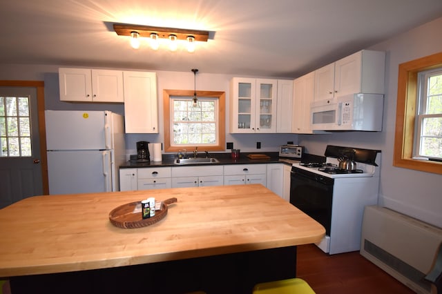 106 Shady Ln, Newport, ME 04953 - kitchen with white appliances, wood counters, glass insert cabinets, and white cabinets