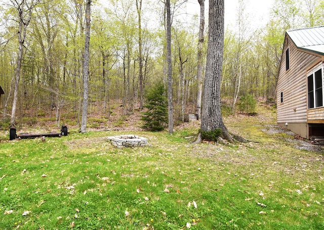 106 Shady Ln, Newport, ME 04953 - view of grassy yard with a fire pit