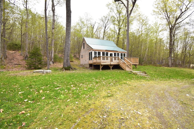 106 Shady Ln, Newport, ME 04953 - back of house with a wooden deck, a yard, metal roof, and stairway