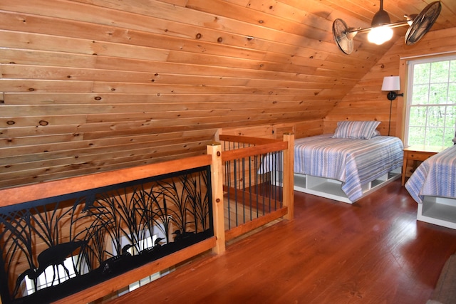 106 Shady Ln, Newport, ME 04953 - bedroom featuring vaulted ceiling, wood finished floors, wooden ceiling, and wood walls