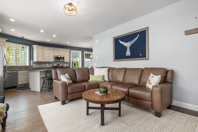 53 Ross Rd, Kennebunk, ME 04043 - living area with light wood-type flooring, recessed lighting, and baseboards