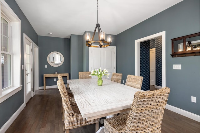53 Ross Rd, Kennebunk, ME 04043 - dining room featuring a chandelier, baseboards, and dark wood finished floors