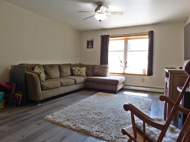 9 Hidden Dr, New Gloucester, ME 04260 - living room with a baseboard radiator, wood finished floors, and ceiling fan