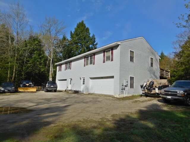 9 Hidden Dr, New Gloucester, ME 04260 - view of home's exterior featuring a garage and driveway
