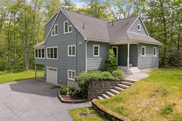 400 Chopps Cross Rd, Woolwich, ME 04579 - view of front of property with roof with shingles, driveway, an attached garage, and a front yard