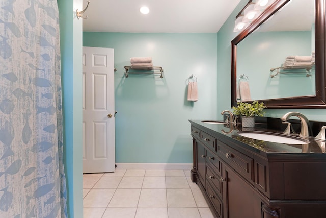 400 Chopps Cross Rd, Woolwich, ME 04579 - full bathroom featuring double vanity, tile patterned floors, baseboards, and recessed lighting