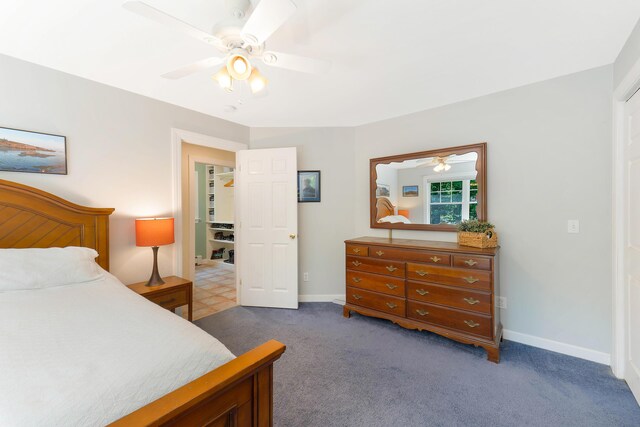 400 Chopps Cross Rd, Woolwich, ME 04579 - bedroom with dark colored carpet, ceiling fan, and baseboards