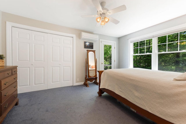 400 Chopps Cross Rd, Woolwich, ME 04579 - bedroom with a wall unit AC, access to outside, dark carpet, a closet, and a ceiling fan