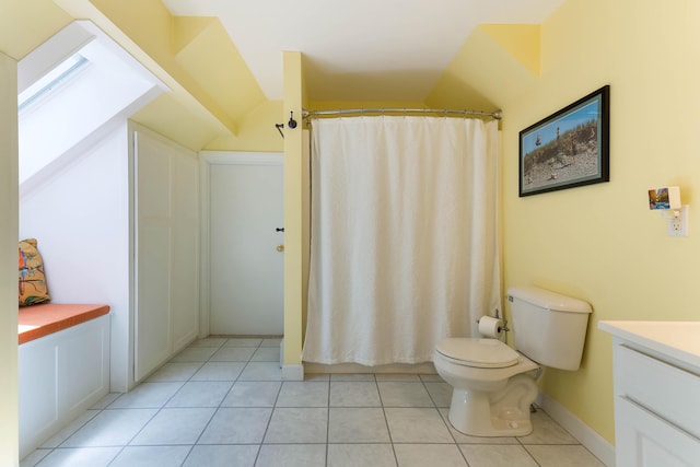 400 Chopps Cross Rd, Woolwich, ME 04579 - full bathroom with toilet, vanity, vaulted ceiling, tile patterned flooring, and a shower with shower curtain