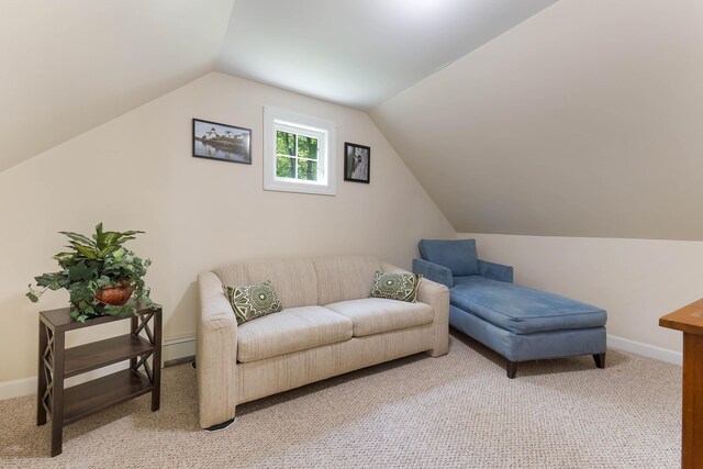 400 Chopps Cross Rd, Woolwich, ME 04579 - living area featuring light colored carpet, baseboards, and vaulted ceiling